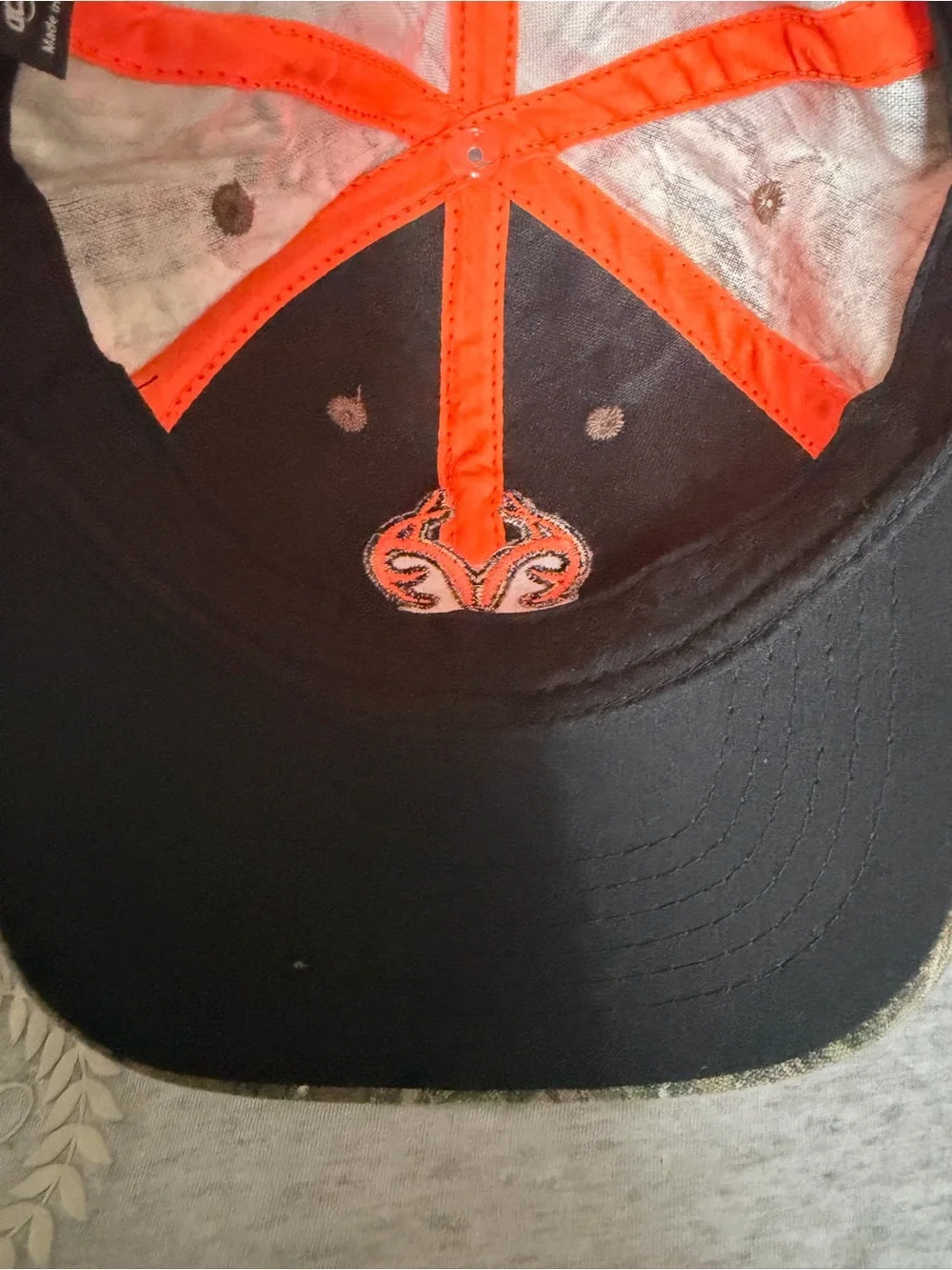Realtree Camo Hat with Bright Orange Logo